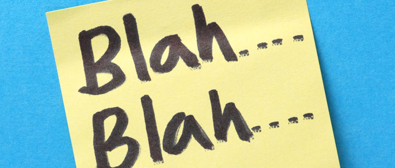 the words blah blah written on a post-it note